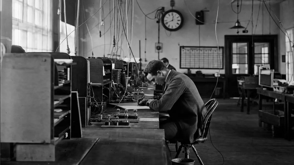 Split scene: a 19th-century telegraph operator wiring a money order beside a modern hand approving an instant transfer on a phone
